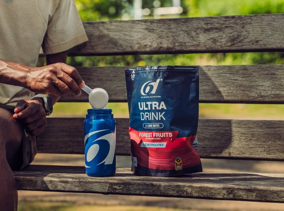 Scooping 6d Ultra Drink in 6d Bottle